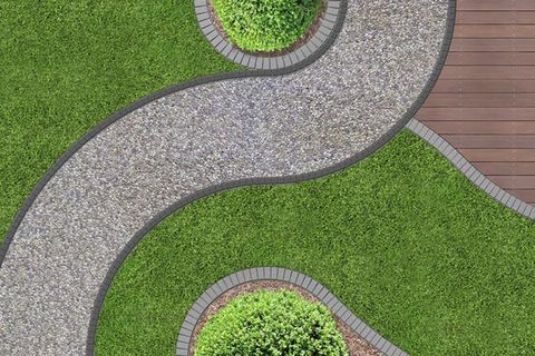 Mature planted garden bed in a Doha landscape
